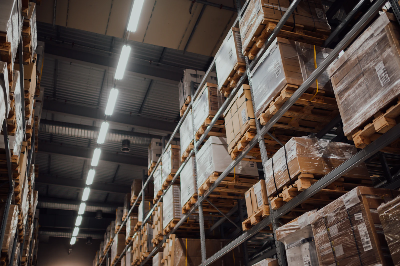 Cardboard boxes stacked on a metal rack